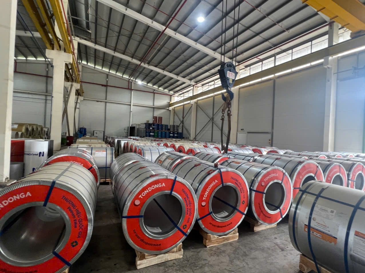 Colour-coated steel coils in warehouse